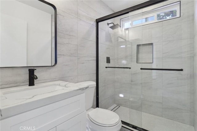 4708 Sunrise Rdg, Oceanside, CA 92056 - bathroom with toilet, vanity, a shower stall, and tile walls
