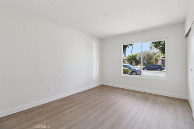 4708 Sunrise Rdg, Oceanside, CA 92056 - empty room with wood finished floors and baseboards