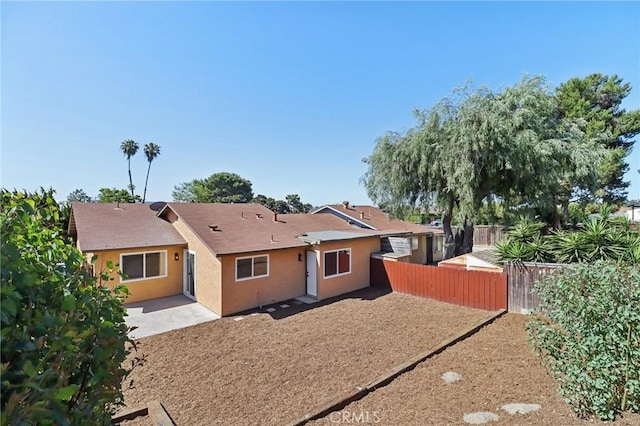 4708 Sunrise Rdg, Oceanside, CA 92056 - rear view of house featuring stucco siding and a patio area