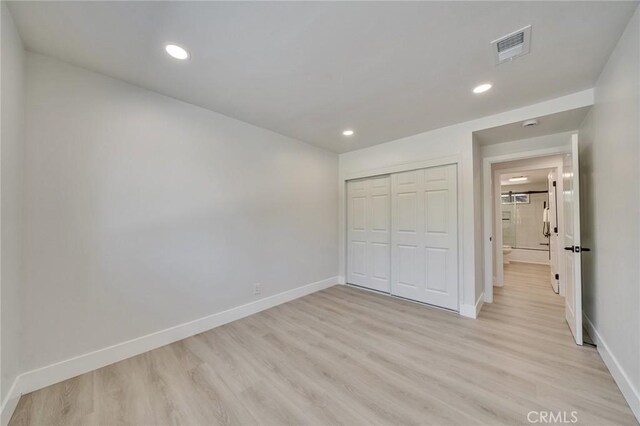 29461 Via Valverde, Laguna Niguel, CA 92677 - unfurnished bedroom with light wood-style floors, baseboards, a closet, and recessed lighting