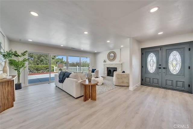29461 Via Valverde, Laguna Niguel, CA 92677 - living room with recessed lighting, light wood-style floors, french doors, baseboards, and a fireplace