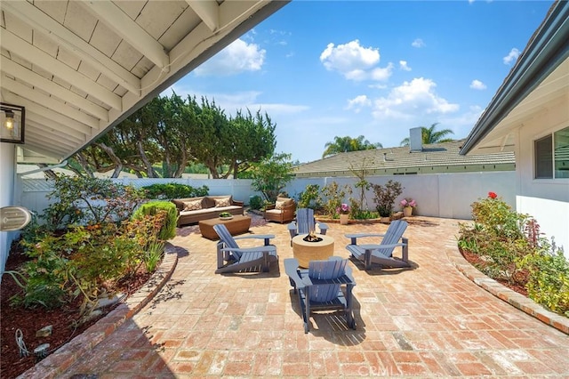 29461 Via Valverde, Laguna Niguel, CA 92677 - fenced backyard with an outdoor living space with a fire pit and a patio area