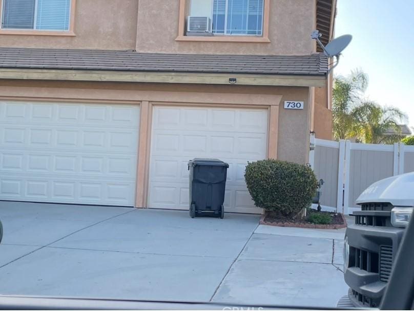 730 Calumet Ave, Beaumont, CA 92223 - garage with concrete driveway
