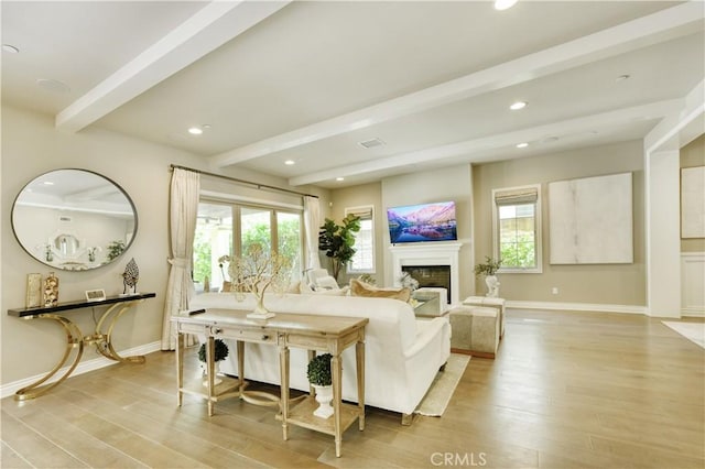 46 Shadybend, Irvine, CA 92602 - living room featuring beam ceiling, light wood-style flooring, plenty of natural light, a fireplace, and recessed lighting