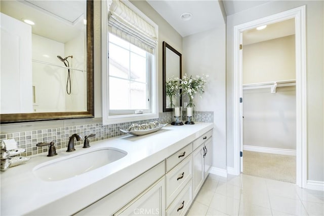 46 Shadybend, Irvine, CA 92602 - full bath featuring double vanity, backsplash, a shower, and baseboards
