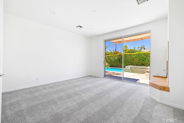 79030 Ladera Dr, La Quinta, CA 92253 - carpeted spare room with baseboards