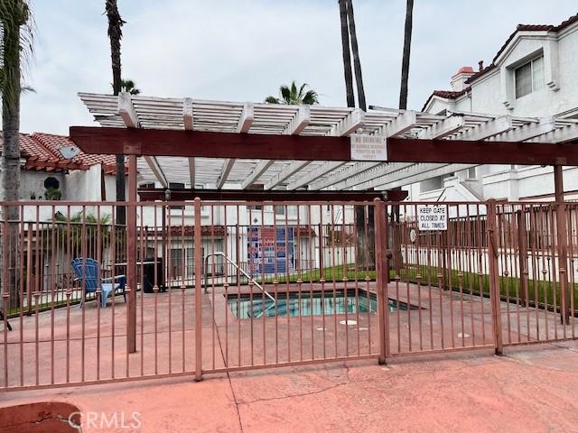 264 E Beverly Blvd Unit A, Montebello, CA 90640 - view of property's community featuring a pergola and a pool