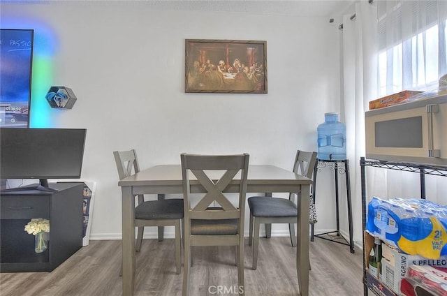 3441 20th St, Highland, CA 92346 - dining room with wood finished floors and baseboards