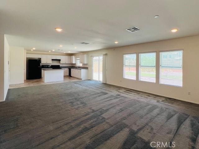 15893 Cordova Rd, Victorville, CA 92394 - unfurnished living room with recessed lighting
