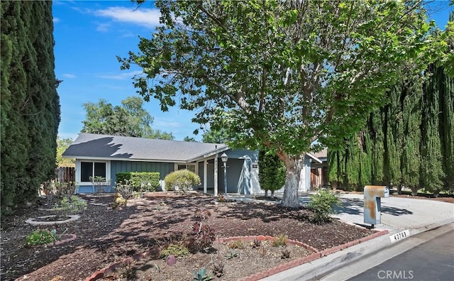 42769 Tierra Robles Pl, Temecula, CA 92592 - view of front facade with a shingled roof