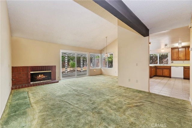 42769 Tierra Robles Pl, Temecula, CA 92592 - unfurnished living room with healthy amount of natural light, a brick fireplace, light carpet, and a sink
