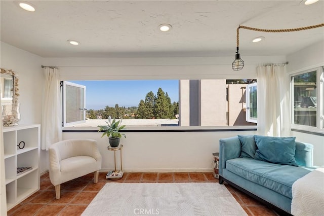 5700 Ravenspur Dr Unit 307, Rancho Palos Verdes, CA 90275 - tiled living area with healthy amount of natural light and recessed lighting