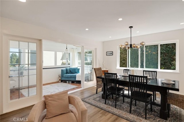 5700 Ravenspur Dr Unit 307, Rancho Palos Verdes, CA 90275 - dining area featuring wood finished floors, a chandelier, and recessed lighting