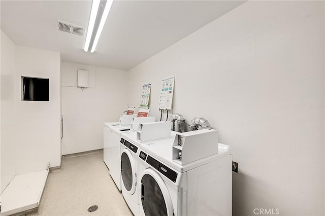 5700 Ravenspur Dr Unit 307, Rancho Palos Verdes, CA 90275 - shared laundry room featuring washer and dryer and light colored carpet