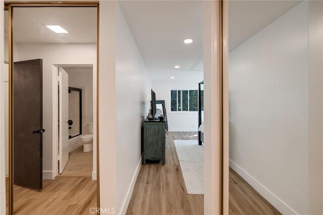 5700 Ravenspur Dr Unit 307, Rancho Palos Verdes, CA 90275 - hall featuring light wood-style flooring, baseboards, and recessed lighting