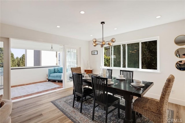 5700 Ravenspur Dr Unit 307, Rancho Palos Verdes, CA 90275 - dining space with light wood-type flooring, a chandelier, recessed lighting, and baseboards
