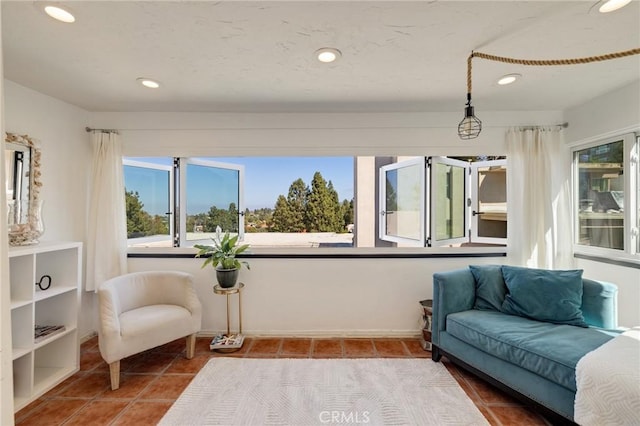 5700 Ravenspur Dr Unit 307, Rancho Palos Verdes, CA 90275 - tiled living room with healthy amount of natural light and recessed lighting