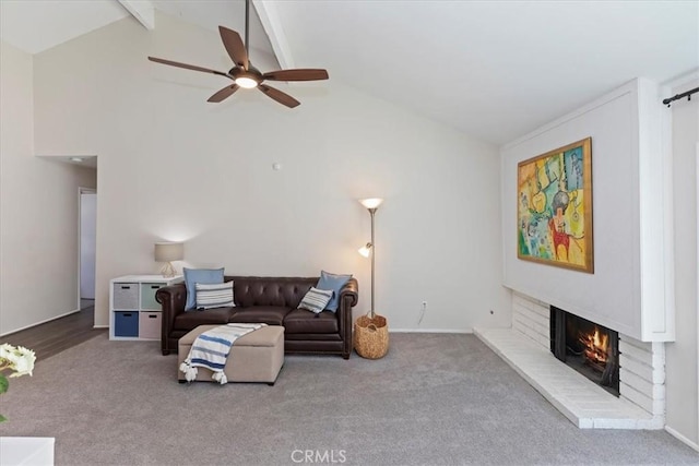 1326 Rosehill Dr, Riverside, CA 92507 - living room featuring carpet, a brick fireplace, a ceiling fan, beam ceiling, and high vaulted ceiling