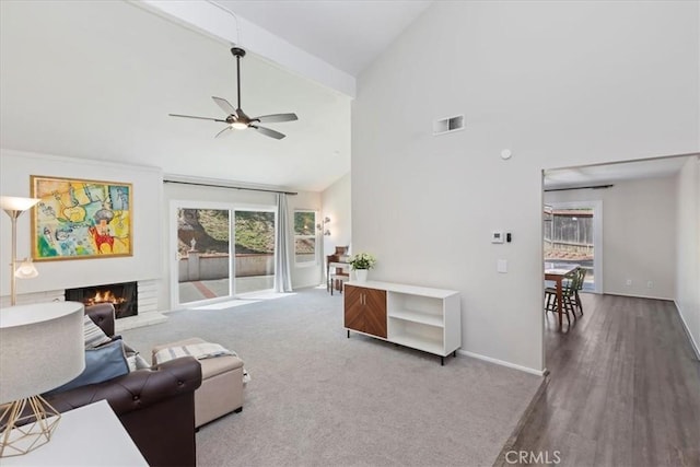 1326 Rosehill Dr, Riverside, CA 92507 - living area featuring a ceiling fan, healthy amount of natural light, high vaulted ceiling, and a fireplace