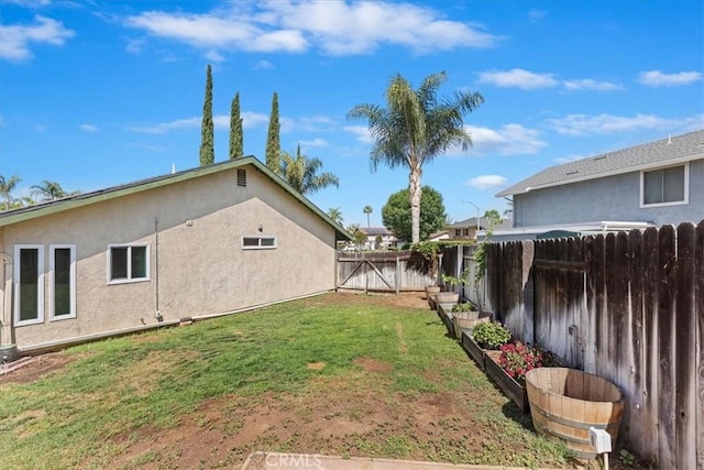 1326 Rosehill Dr, Riverside, CA 92507 - fenced backyard featuring a vegetable garden