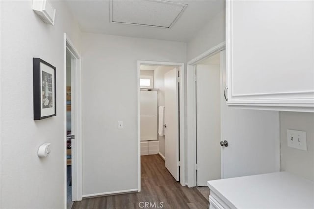 1326 Rosehill Dr, Riverside, CA 92507 - hall with dark wood-style floors and attic access
