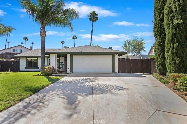 1326 Rosehill Dr, Riverside, CA 92507 - ranch-style house with a garage and concrete driveway