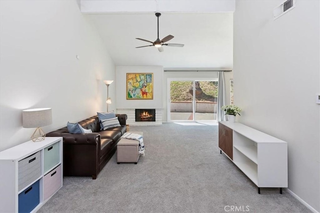 1326 Rosehill Dr, Riverside, CA 92507 - living room with light carpet, ceiling fan, high vaulted ceiling, and a brick fireplace