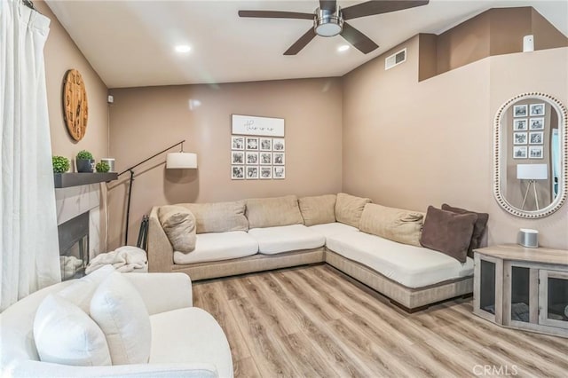 2618 W Loma Vista Dr, Rialto, CA 92377 - living room featuring wood finished floors, a ceiling fan, and recessed lighting