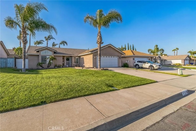 2618 W Loma Vista Dr, Rialto, CA 92377 - single story home featuring driveway, stucco siding, and an attached garage