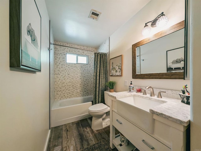8635 La Butte Ln, Santee, CA 92071 - full bath featuring wood finished floors, vanity, shower / bath combo, and toilet