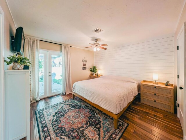 8635 La Butte Ln, Santee, CA 92071 - bedroom with access to exterior, hardwood / wood-style floors, wooden walls, and ceiling fan