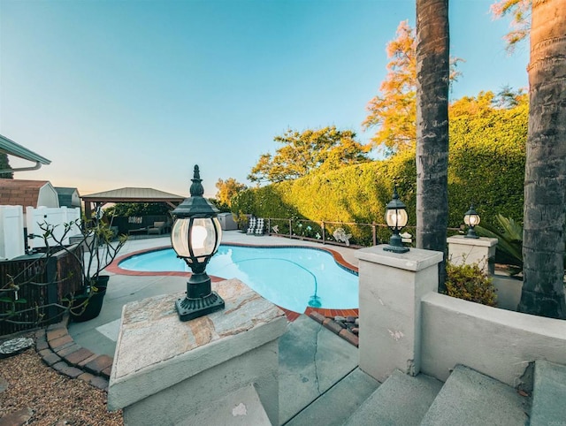 8635 La Butte Ln, Santee, CA 92071 - view of pool featuring a gazebo, a fenced backyard, and a patio