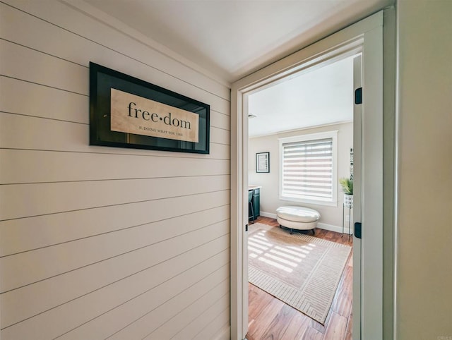 8635 La Butte Ln, Santee, CA 92071 - hall with wood finished floors, wood walls, and baseboards