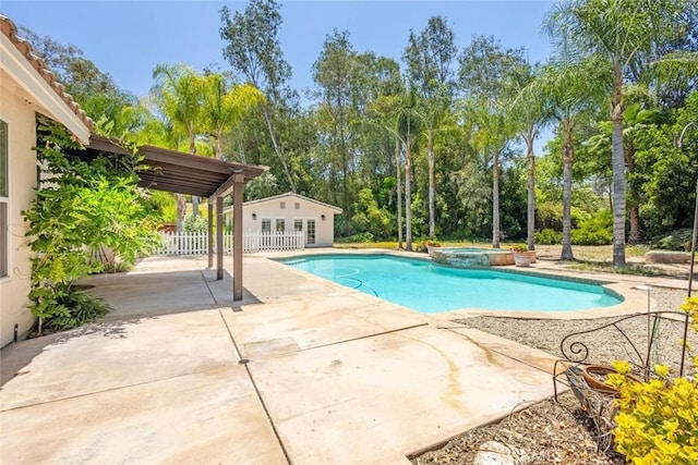 24563 Calle Perla, Murrieta, CA 92562 - view of pool featuring a patio area, a pool with connected hot tub, and view of wooded area