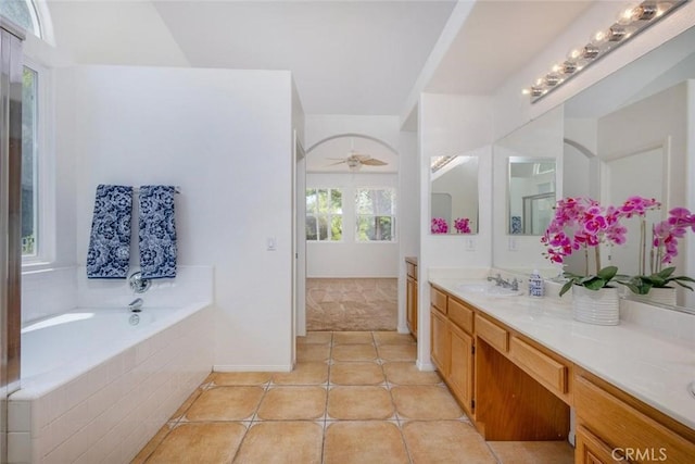 24563 Calle Perla, Murrieta, CA 92562 - full bathroom with vanity, a garden tub, tile patterned floors, and baseboards