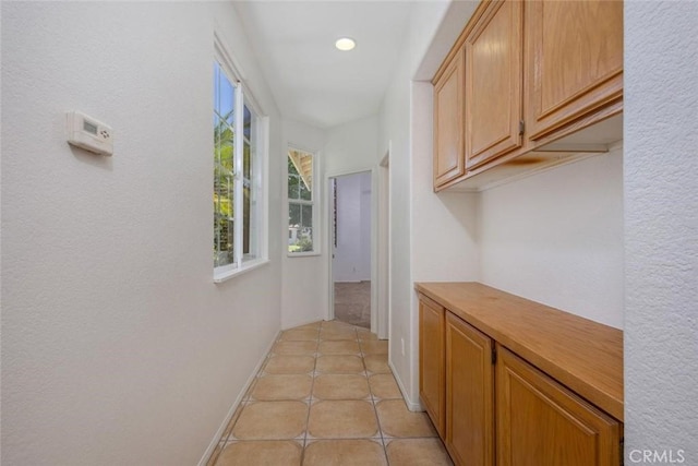 24563 Calle Perla, Murrieta, CA 92562 - hall featuring light tile patterned flooring and baseboards