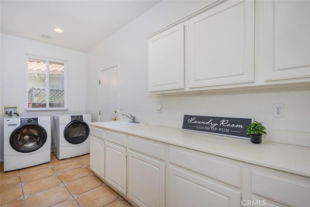 24563 Calle Perla, Murrieta, CA 92562 - laundry area with cabinet space, washing machine and dryer, light tile patterned floors, and recessed lighting