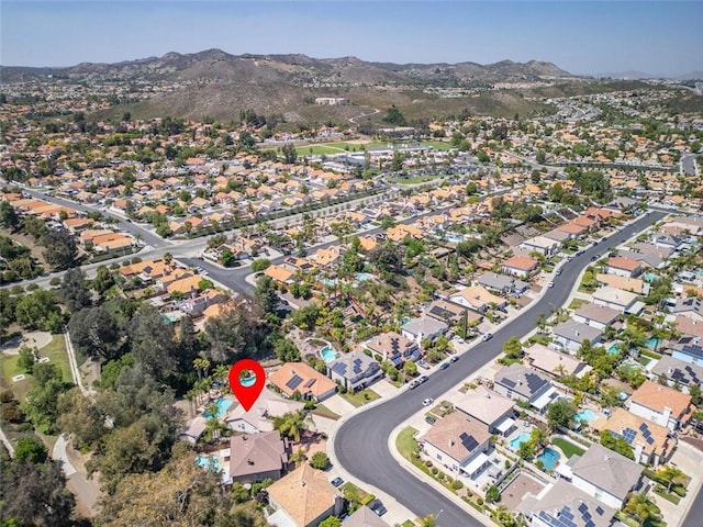 24563 Calle Perla, Murrieta, CA 92562 - aerial view of property's location with a mountain backdrop and nearby suburban area