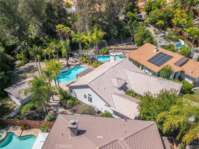 24563 Calle Perla, Murrieta, CA 92562 - bird's eye view of a pool area and a tree filled landscape