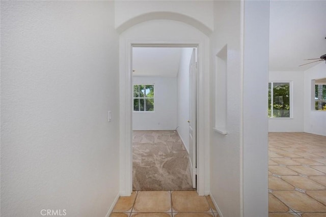 24563 Calle Perla, Murrieta, CA 92562 - hall with light tile patterned floors and arched walkways