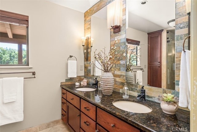 558 Paseo Companeros St, Chico, CA 95928 - bathroom featuring double vanity, tile patterned floors, baseboards, and a shower with shower door