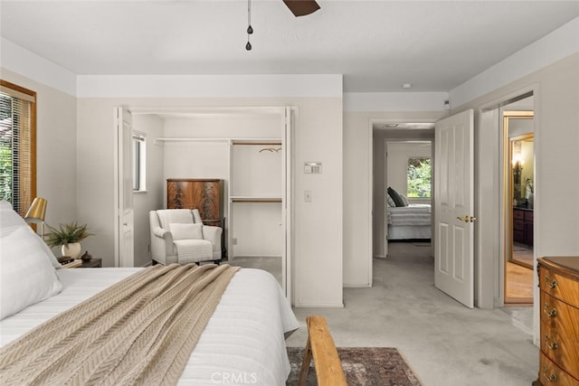 558 Paseo Companeros St, Chico, CA 95928 - bedroom with light carpet, a ceiling fan, and a closet