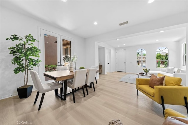 97 Twin Gables, Irvine, CA 92620 - dining area featuring recessed lighting, light wood-style flooring, and baseboards
