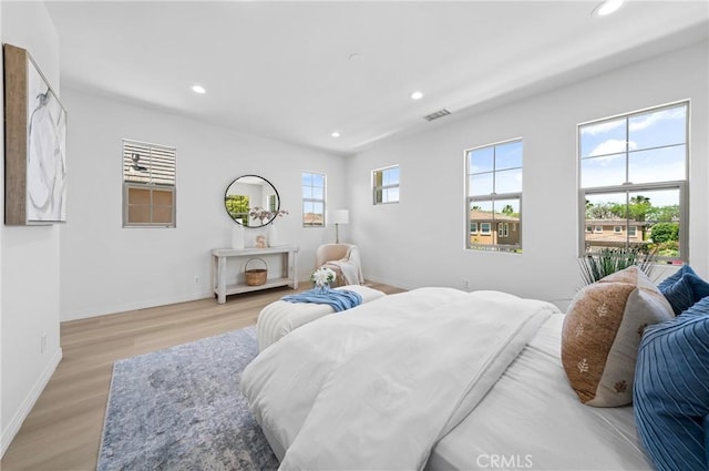 97 Twin Gables, Irvine, CA 92620 - bedroom with recessed lighting, light wood-style floors, and baseboards