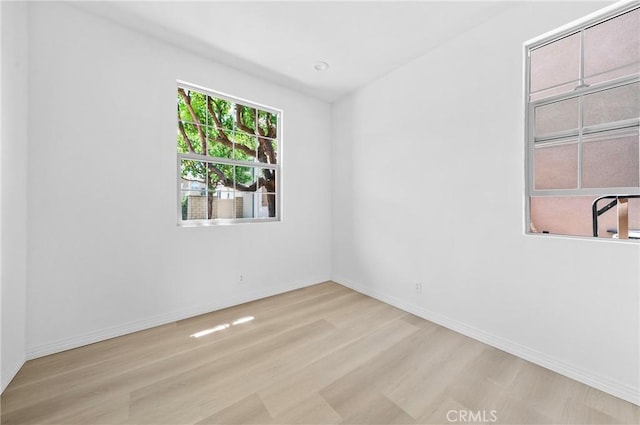 97 Twin Gables, Irvine, CA 92620 - empty room with wood finished floors and baseboards