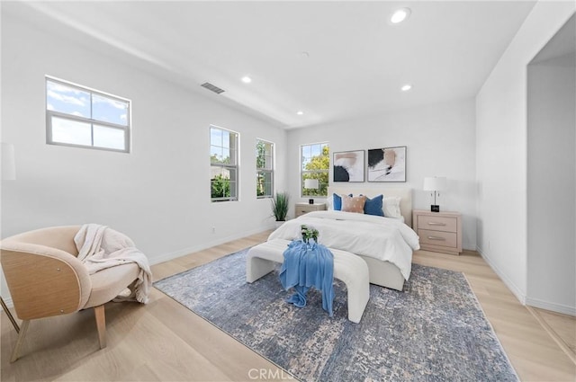 97 Twin Gables, Irvine, CA 92620 - bedroom featuring light wood-style floors, recessed lighting, and baseboards