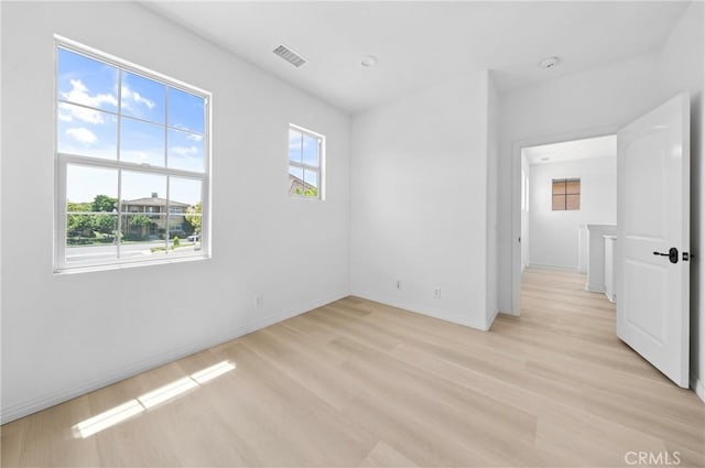97 Twin Gables, Irvine, CA 92620 - spare room with light wood finished floors and baseboards