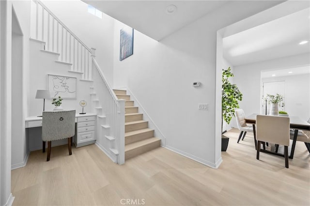 97 Twin Gables, Irvine, CA 92620 - staircase with wood finished floors, baseboards, recessed lighting, and a high ceiling
