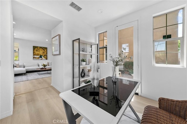 97 Twin Gables, Irvine, CA 92620 - dining room featuring wood finished floors, healthy amount of natural light, baseboards, and recessed lighting