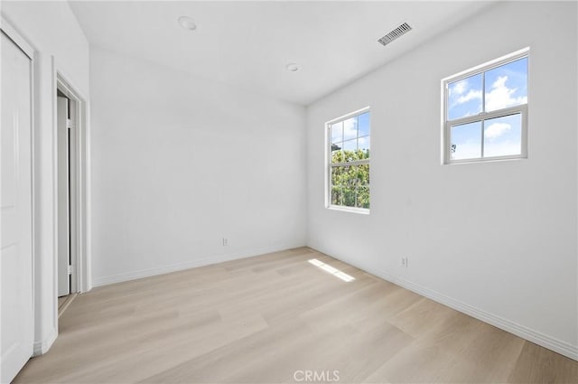 97 Twin Gables, Irvine, CA 92620 - unfurnished bedroom with light wood-style floors and baseboards